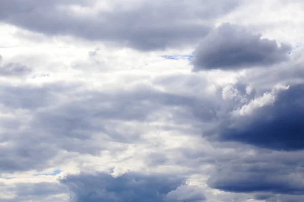 A natural summer background with a cloudy sky before a thunderstorm. Weather phenomenon, cyclone.