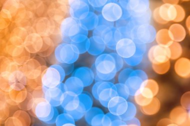 Mutlu yeni yıl, Merry Christmas, tatil için kutlama veya poster için bokeh etkisi ile mavi ve altın sarı renk soyut şenlikli sihirli parlak disko arka plan