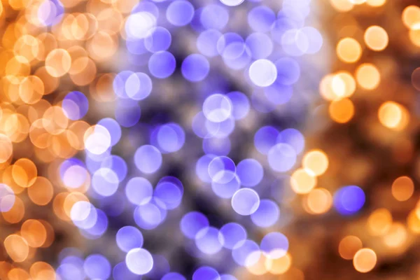 Astratto festivo magico sfondo disco lucido viola lilla e giallo dorato con effetto bokeh per congratulazioni o poster per il nuovo anno, Buon Natale, vacanza — Foto Stock