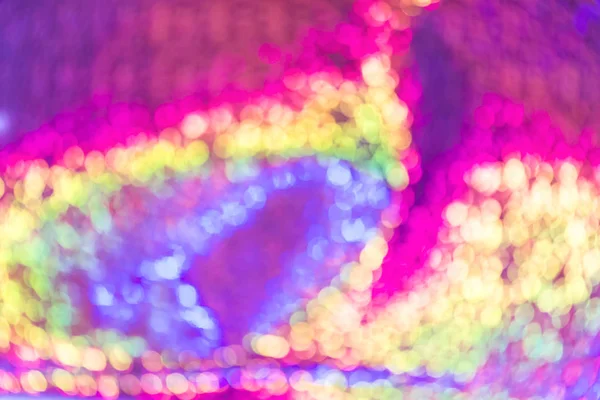 Background multicolored abstract rainbow purple holographic bright with a gradient shining with the effect of a bokeh of pink yellow and blue — Stock Photo, Image
