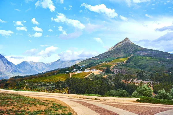 Stellenbosch is a town in the Western Cape province of South Africa, situated about 50 kilometres (31 miles) east of Cape Town, along the banks of the Eerste River at the foot of the Stellenbosch Mountain. It is the second oldest European settlement