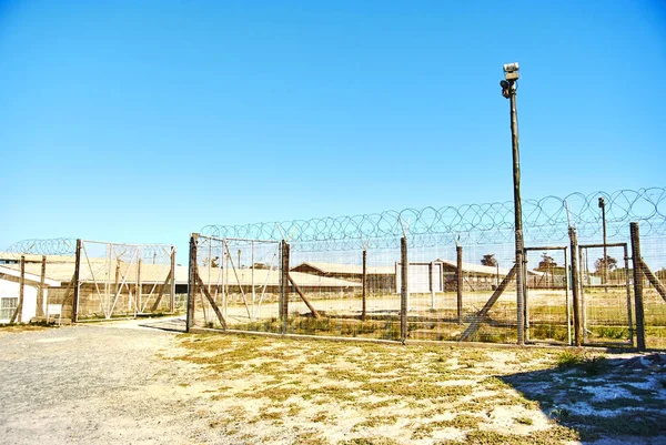 Robben Island (Afrikaans: Robbeneiland) island in Table Bay, west of the coast of Bloubergstrand, Cape Town, South Africa. The name is Dutch for \