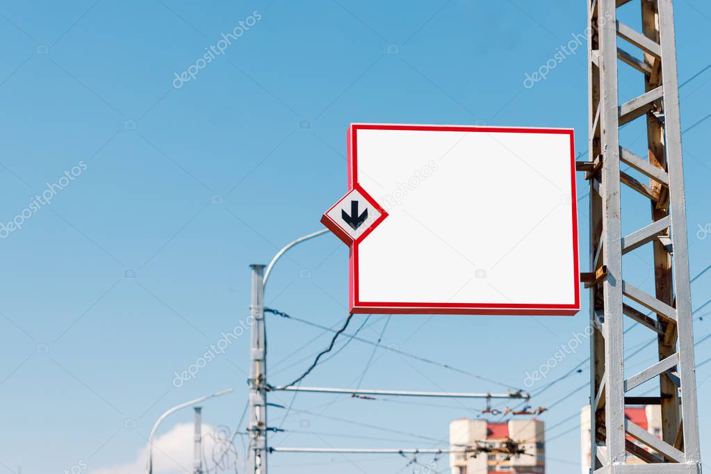 Billboard, billboard, canvas billboard, layout against the blue sky. The concept of outdoor advertising, marketing, sales. mockup