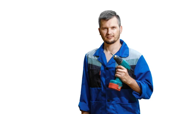 Man Builder Robes Screwdriver His Hands Overalls White Background Isolate — Stock Photo, Image