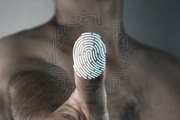Scanning a fingerprint for identification. The concept of security system, the technology of scanning a fingerprint.