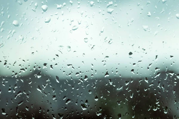 創造的な背景 ガラス 雨の滴雨の日窓からの眺め 機嫌が悪い 悲しみの概念 — ストック写真