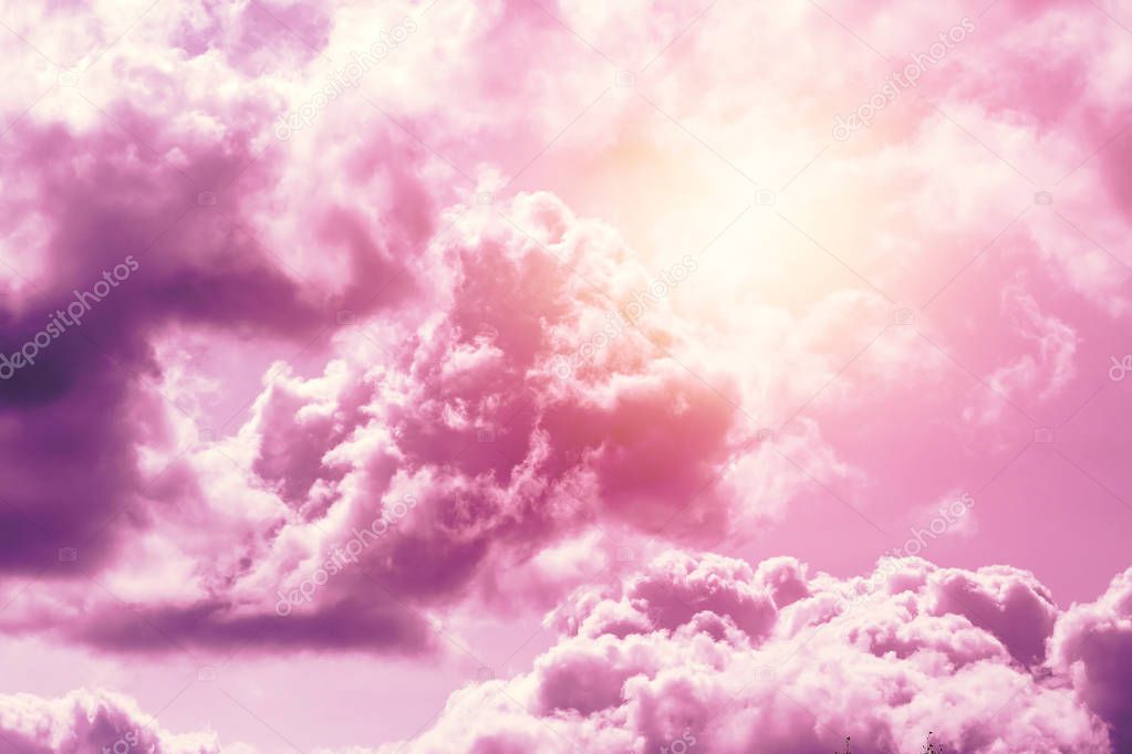 Creative background, pink, fluffy, vanilla clouds. The concept of lightness, magic, magic, fairy tale, good. Background for cards, flyers.