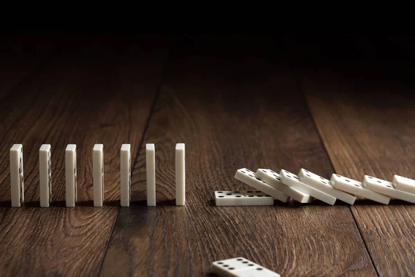 Creative Background White Domino Brown Wooden Background Concept Domino Effect — Stock Photo, Image