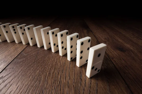 Creative Background White Domino Brown Wooden Background Concept Domino Effect — Stock Photo, Image