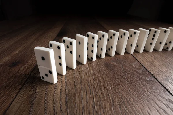 Creative Background White Domino Brown Wooden Background Concept Domino Effect — Stock Photo, Image