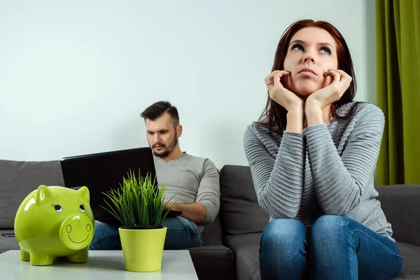 Unhappy Wife Sits Bored Background Her Husband Plays Laptop While — Stock Photo, Image