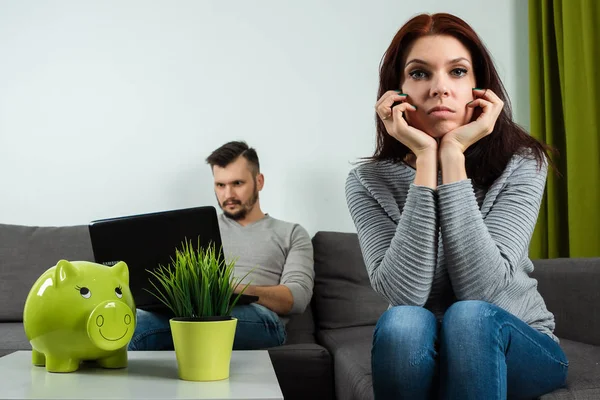 Unhappy Wife Sits Bored Background Her Husband Plays Laptop While — Stock Photo, Image