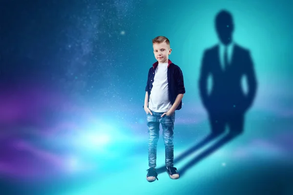 The choice of profession, the future of the child. The boy dreams of becoming a businessman. Concept of profession, finance, entrepreneurship, children's dreams. Mixed media — Stock Photo, Image