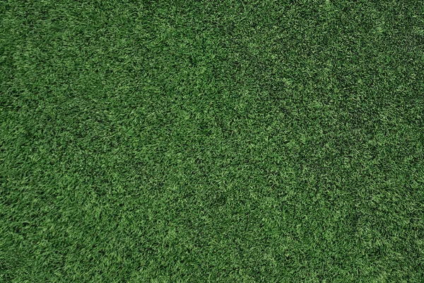 Top view of artificial grass, texture of green artificial lawn. — Stock Photo, Image