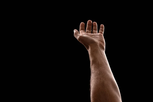 Mani maschili primo piano isolato su sfondo nero — Foto Stock