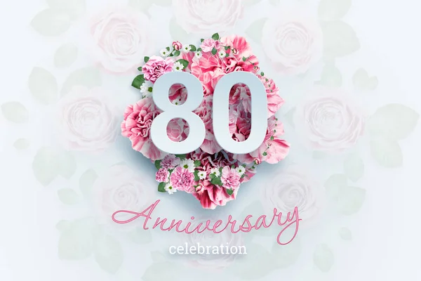 Creative background lettering 80 numbers and anniversary celebration text on pink flowers background. Anniversary concept, birthday, celebration event, template, flyer