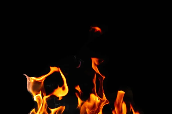 Fire, flames on a black background isolate. Concept fire grill heat weekend barbecue. — Stock Photo, Image