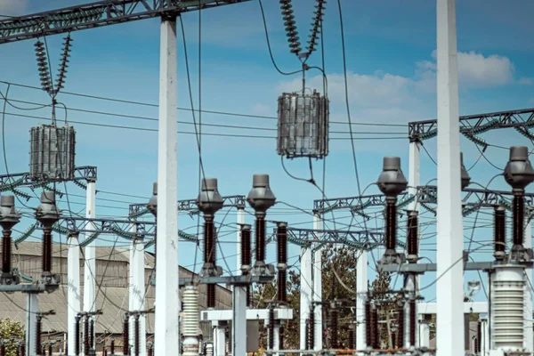 High-voltage transformer substation. High voltage power lines