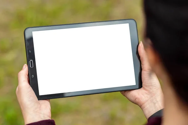 Hand with tablet lying on it, map-case close-up, white screen mockup, layout