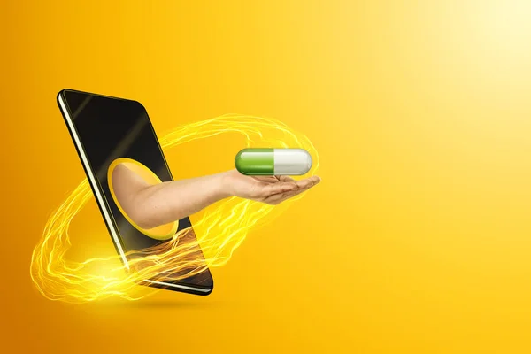 Ruka Doručuje Tablety Pilulky Přes Smartphone Žlutém Pozadí Online Koncept — Stock fotografie