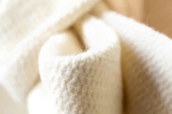 Zbliżenie: biała wstążka Gruba material.coat lub kurtka. — Zdjęcie stockowe
