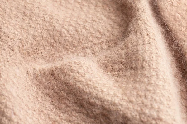 Rosa beige patrón puntada de punto de lana fondo . — Foto de Stock