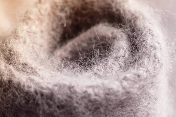 Rollo de gris beige patrón puntada de punto de lana fondo . — Foto de Stock