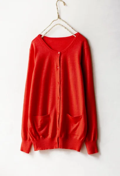 Beautiful, luxurious, knitted cardigan in red, autumn, winter, spring,warm. — Stock Photo, Image