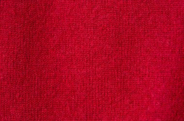 Pamuk veya yün veya kaşmiryapılmış kırmızı desen örme kumaş Arka plan dokusu.