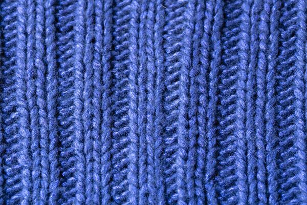 blue rib or cable stitch knitted woolen background