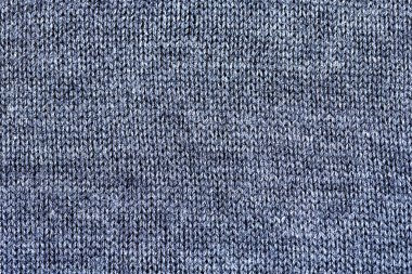 Pamuk veya yünden yapılmış gri desenli örme kumaşın arka plan dokusu.