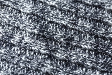 Pamuk veya yünden yapılmış siyah ve beyaz iplikler yün doku. Closeup.
