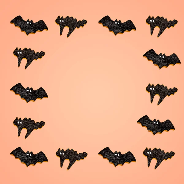 Set of black bats with cats isolated on orange color background. Halloween ornament is colorful Tones. — Stock Photo, Image