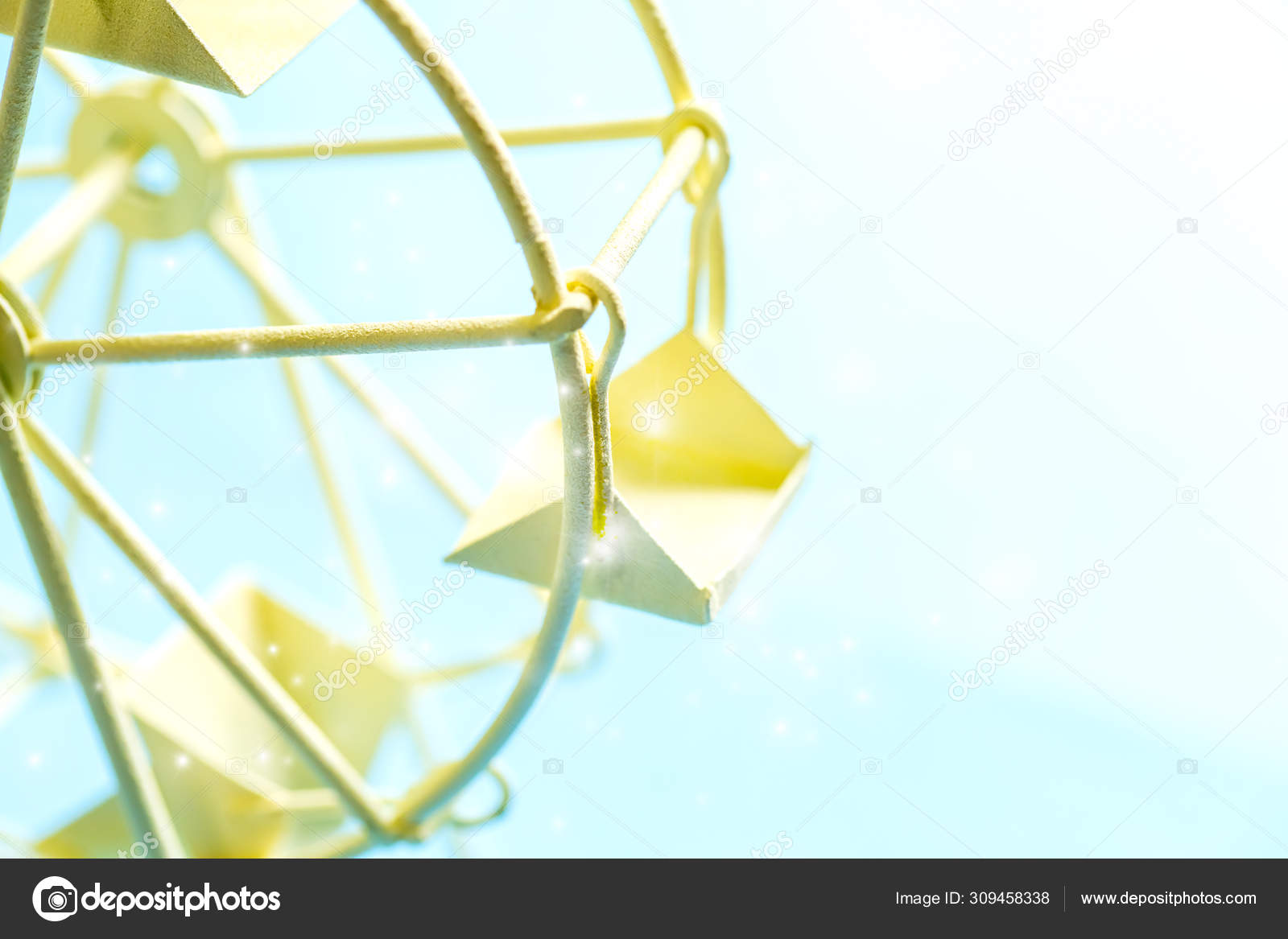 Ferris wheel of the toy on blue sky background and copy space. — Stock