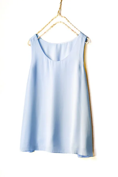 Light Blue Tank Top Hanging Hanger White Wall Close — стоковое фото