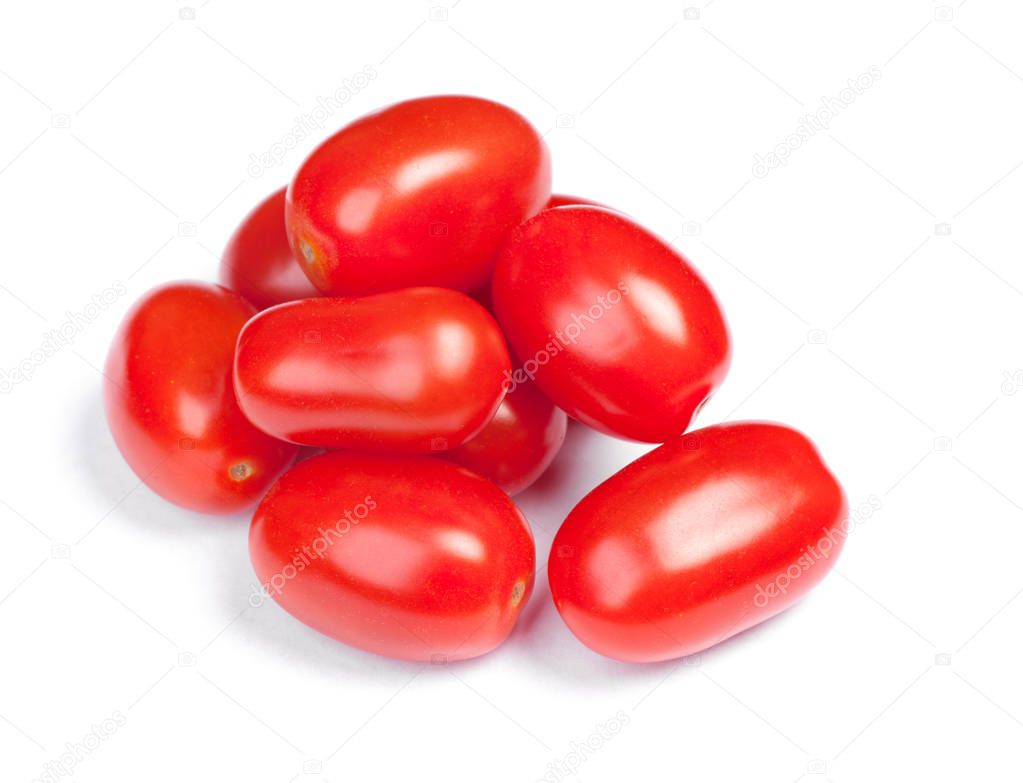 Heap of cherry tomatoes isolated on white background