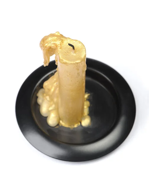Starý zlatý vosková svíčka — Stock fotografie