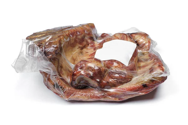 Vacuum packed smoked pork ribs — Stock Photo, Image