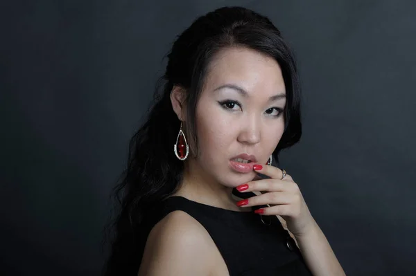 Portrait of woman in black dress — Stock Photo, Image