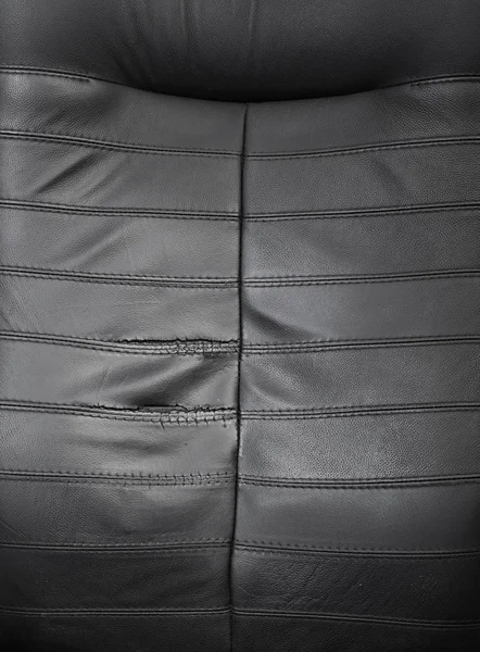 Black torn leather texture — Stock Photo, Image