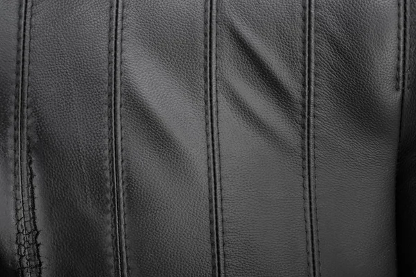 Black torn leather texture — Stock Photo, Image