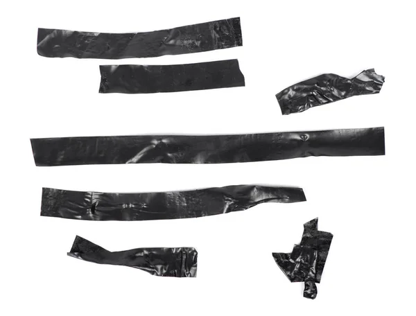 Kolekce černých lepících elektrických pásek — Stock fotografie