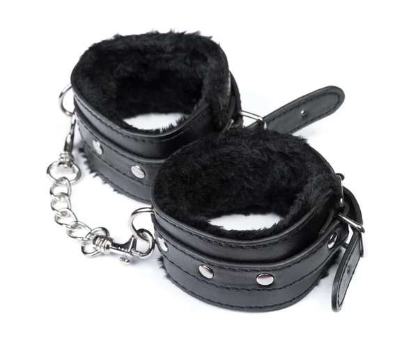 Pair of a black fetish leather handcuffs — Stock Photo, Image