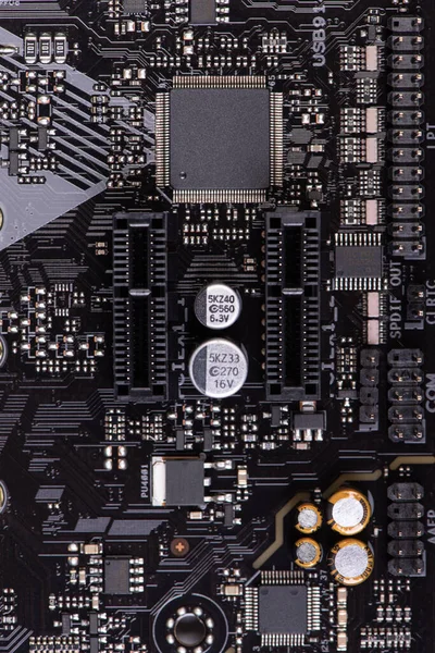 Computer mother board close-up. Circuit board background