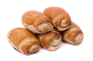 Beyaz arka planda izole edilmiş bir grup lezzetli çörek.