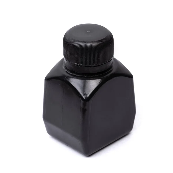 Botella Plástico Cuadrada Negra Aislada Sobre Fondo Blanco —  Fotos de Stock