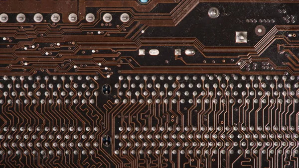 Modern printed brown circuit board, electronic circuit board, textolite. Background banner.