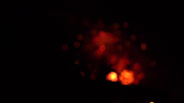 Fuochi d'artificio cerchio rosso e oro con bokeh. Sfondo vacanza — Video Stock