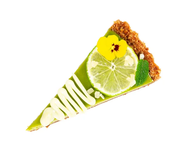 Piece of cheesecake with lime and fresh mint — Stock Photo, Image