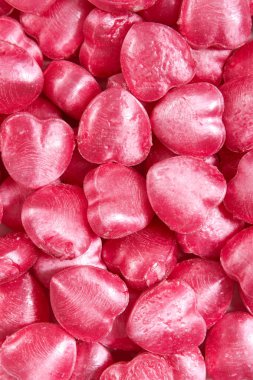 Arka plan olarak kalp şeklinde emme şekerler.  